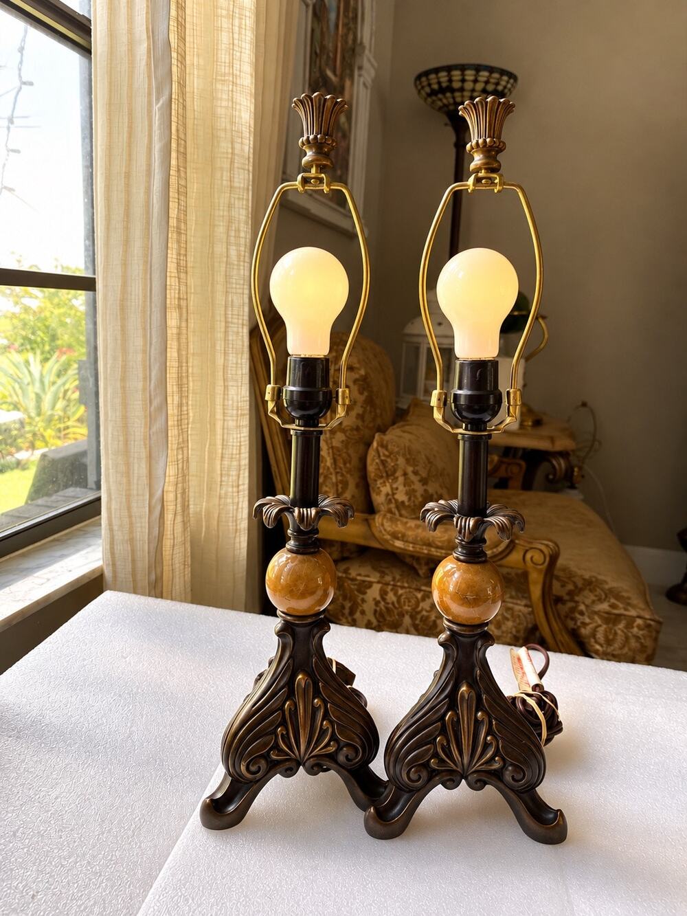 vintage pair of ornate table lamps polished natural stone a dark bronze finish